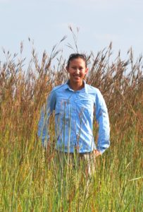 Kim La Pierre in tall grasses