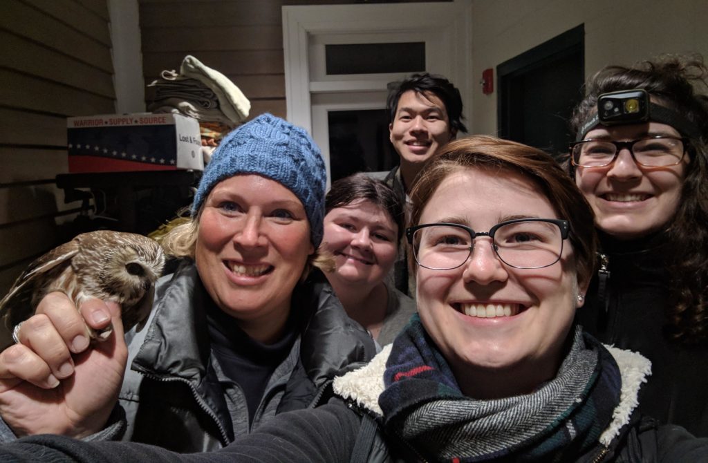 Melissa and four banders take a selfie with an owl